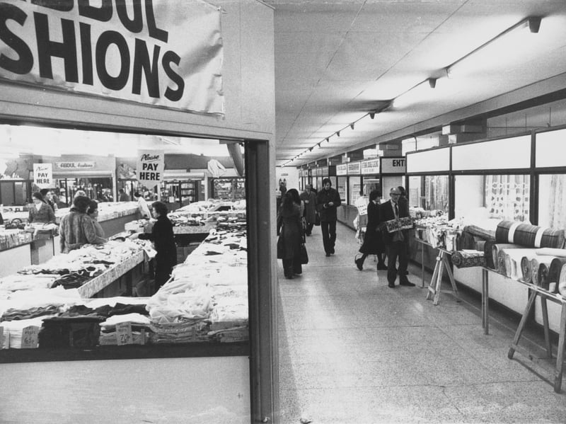 Shoppers browse in 1976.