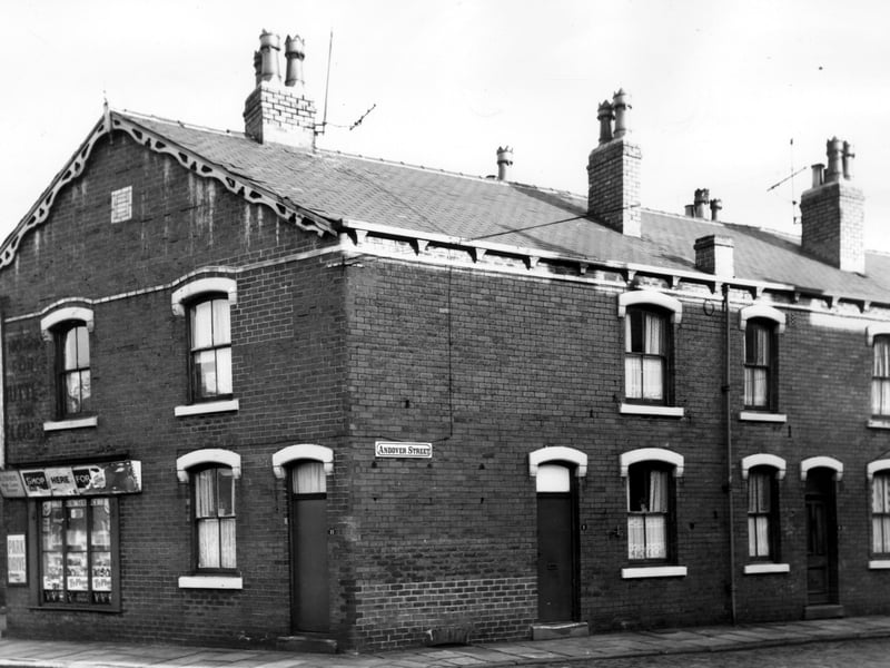 On the left, at number 9 Lady Pit Lane, is a grocery and the business of A. Thorpe. It had been a grocery for many years. Number 11 Lady Pit Lane is part of the same property as 1 Andover Street. Pictured in November 1965.