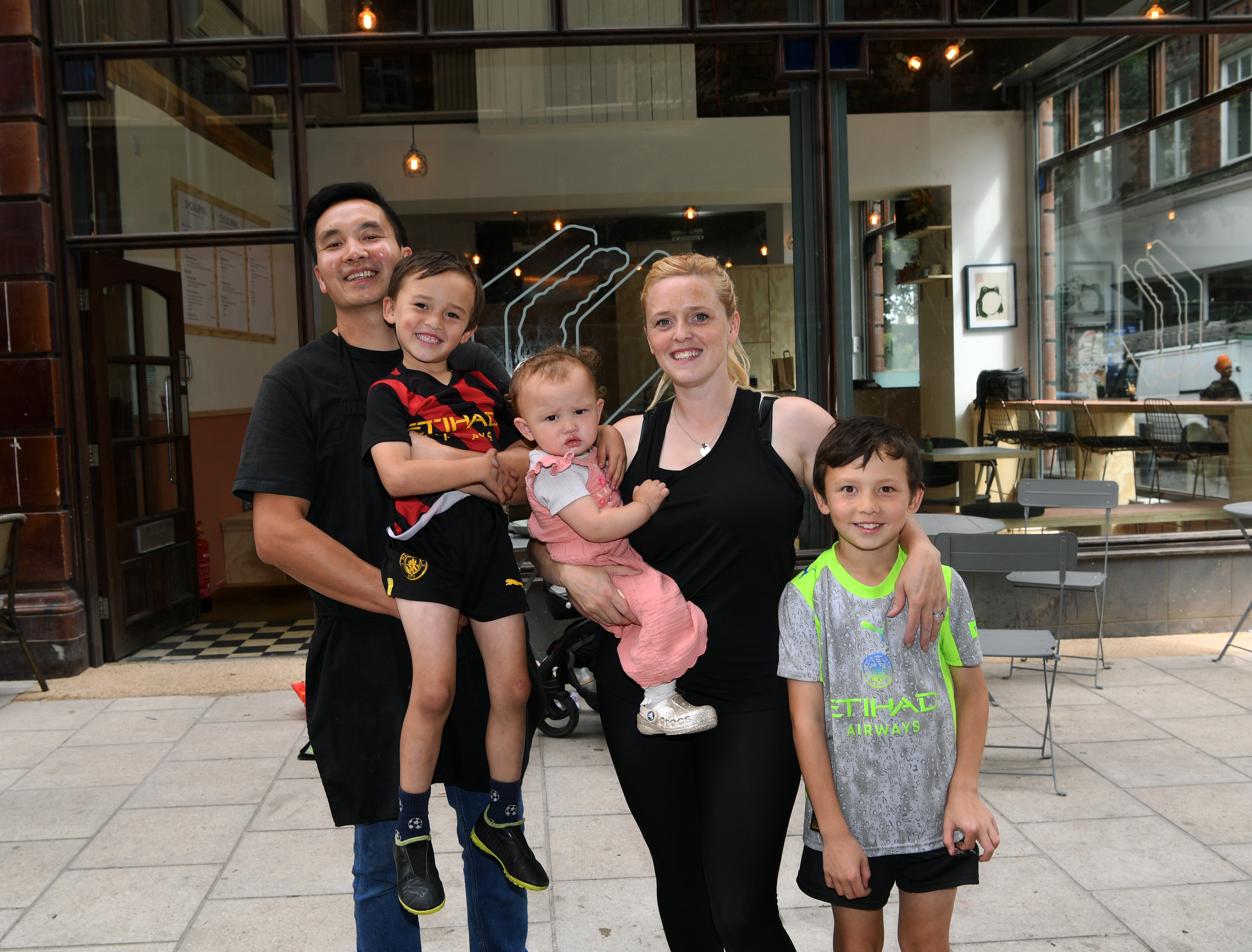 Owners Alan and Alison Tang with their children, Jude, Autumn and Gabriel.