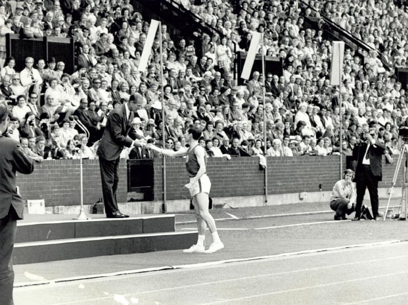 The baton arrives at the Opening Ceremony of the 1970 Edinburgh Commonwealth Games.