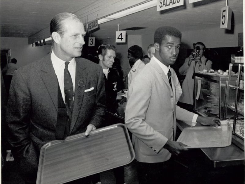 HRH Prince Philip and Don Quarrie in the dining room at the 1970 Edinburgh Commonwealth Games.