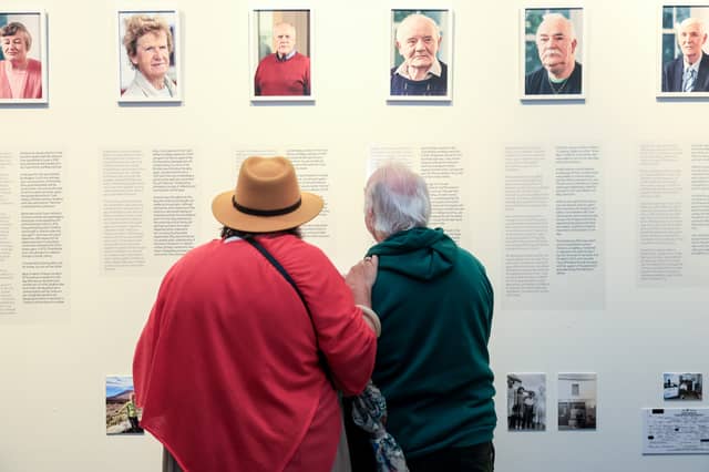 Reading the survivors' stories at the exhibition in the Galway City Museum.