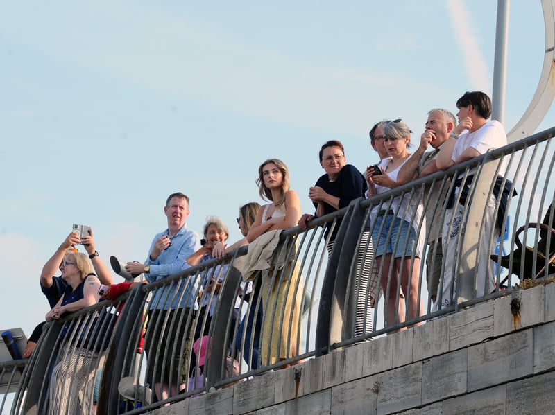 HMS Prince of Wales returned home to HMNB Portsmouth on July 24, 2026, after completing the first phase of Operation Firecrest. Families and friends gathered along the Hot Walls and on The Round Tower in Old Portsmouth to welcome the sailors back to base.