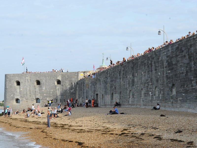 HMS Prince of Wales returned home to HMNB Portsmouth on July 24, 2026, after completing the first phase of Operation Firecrest. Families and friends gathered along the Hot Walls and on The Round Tower in Old Portsmouth to welcome the sailors back to base.