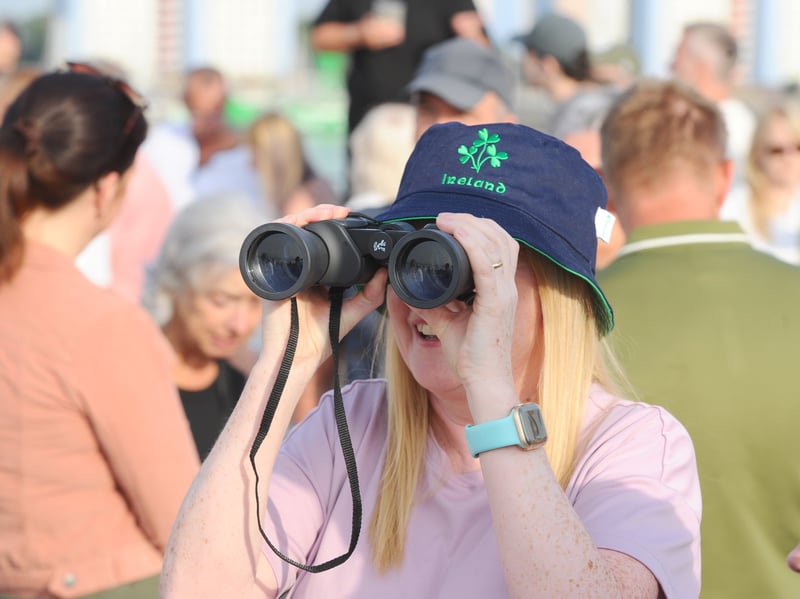 HMS Prince of Wales returned home to HMNB Portsmouth on July 24, 2026, after completing the first phase of Operation Firecrest. Families and friends gathered along the Hot Walls and on The Round Tower in Old Portsmouth to welcome the sailors back to base.