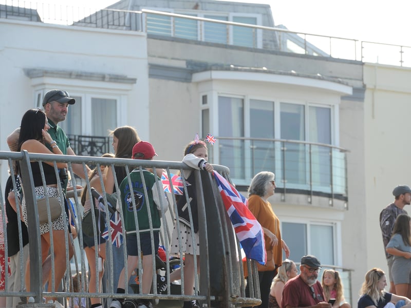 HMS Prince of Wales returned home to HMNB Portsmouth on July 24, 2026, after completing the first phase of Operation Firecrest. Families and friends gathered along the Hot Walls and on The Round Tower in Old Portsmouth to welcome the sailors back to base.