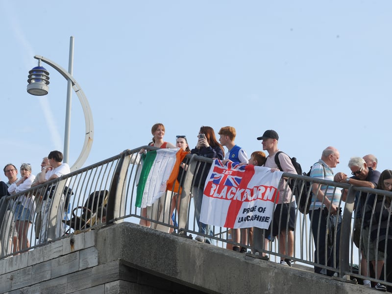 HMS Prince of Wales returned home to HMNB Portsmouth on July 24, 2026, after completing the first phase of Operation Firecrest. Families and friends gathered along the Hot Walls and on The Round Tower in Old Portsmouth to welcome the sailors back to base.