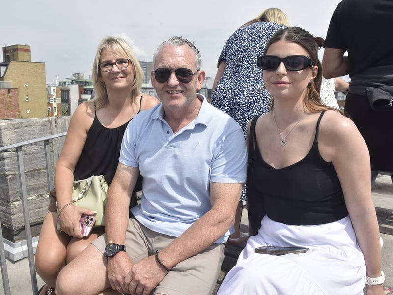 Pictured is: (l-r) Amanda and John Mould with Ella Hudson, waiting to see 25-year-old George Mould aboard HMS Duncan. All have travelled from Salisbury.