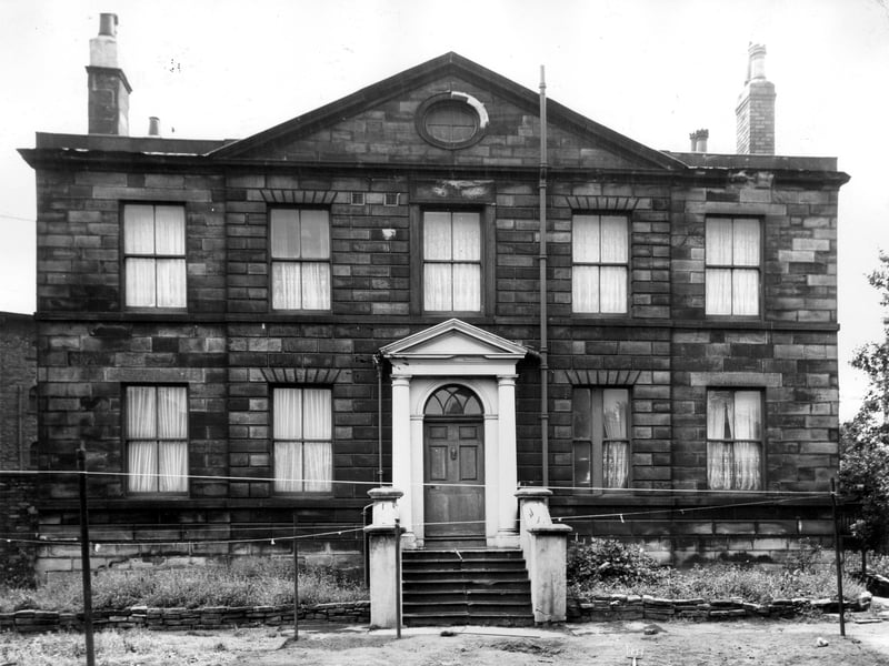 Number 24 Crown Point Road was built for John Chadwick at the end of the 18th Century. Chadwick owned a dye-house on the River Aire and this property is a fine example of a wealthy textile businessman's home. This is the front view of the house which faces away from Crown Point Road. Pictured in July 1965.