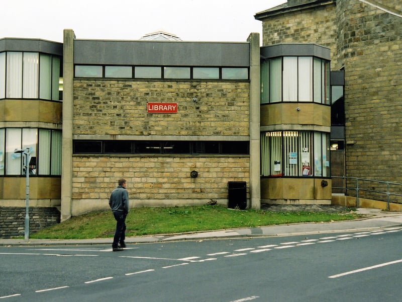 Horsforth Library, at the corner of Church Lane and Town Street in the foreground. The Library originated in 1917 in the old Mechanic's Institute building, far right. Pictured in October 2003.