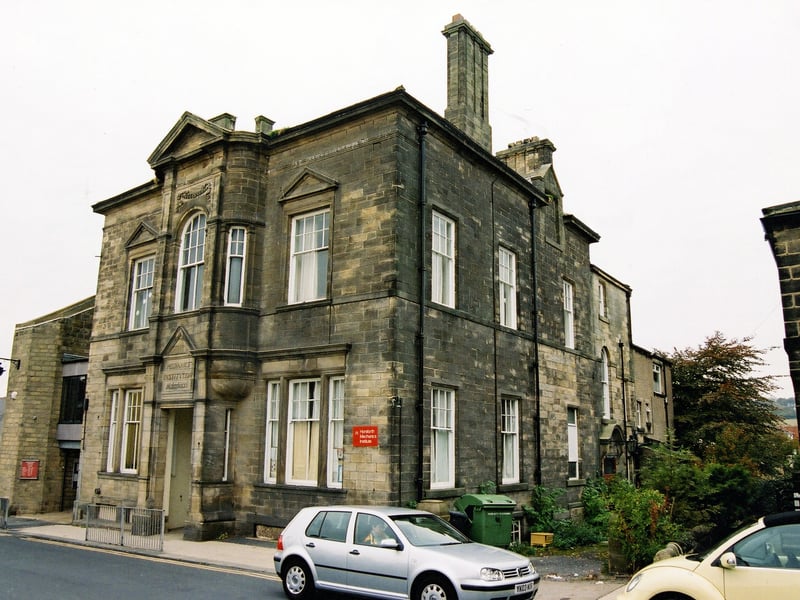 The Mechanics Institute on Town Street where the library originated in 1917. It was built on land given by Sir W.T.W. Spencer-Stanhope in 1882. Constructed in millstone grit it has a datestone carved above the entrance. Adjoining it, on the left is the 1970s addition to the library.