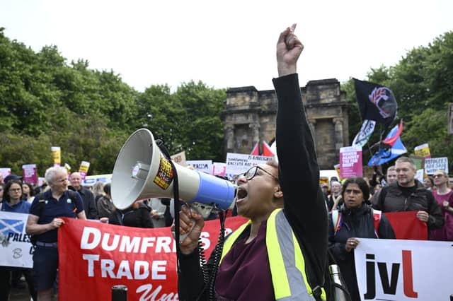 Counter protesters from Stand Up To Racism gather ahead of the Unite the Clans Scotland anti-immigration protest, at Glasgow Green.