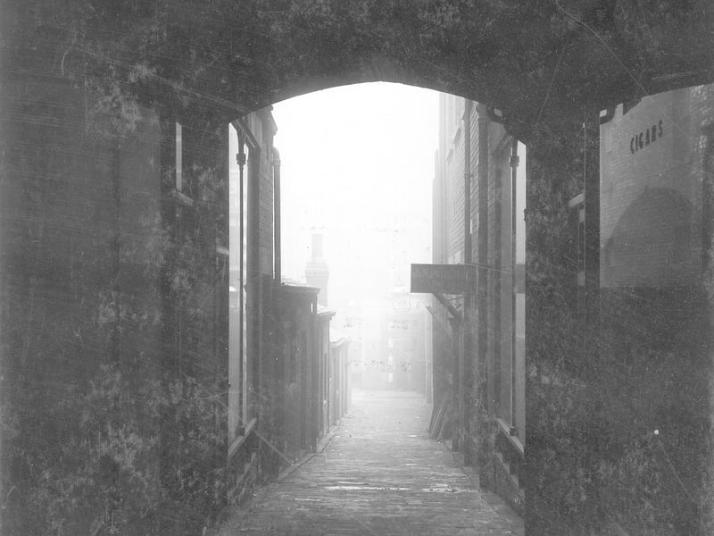 The Angel Inn actually closed in 1903 but was then used as business premises. Photo shows from entrance to yard, Lands Lane in March 1907.