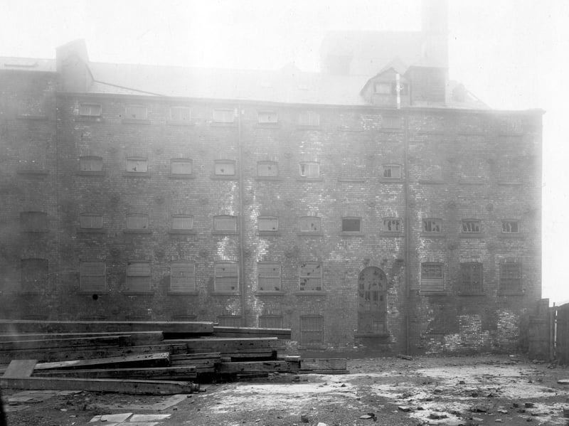 Isle of Cinder, Victoria Flour Mill pictured in February 1907 before demolition as part of the Sovereign Street improvements. Established in 1836 by Roger Shackleton, there were four mill buildings. Not all property was demolished in the area, some were eventually restored and by 1992 opened as Victoria Wharf, including Leodis restaurant.
