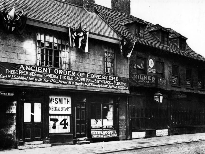 The south side of Kirkgate, from Old Crown Yard to Wharf Street, with the former old Crown Inn, used as shop premises for Mr Smith, medical botanist, and Tolson's noted tripe shop.