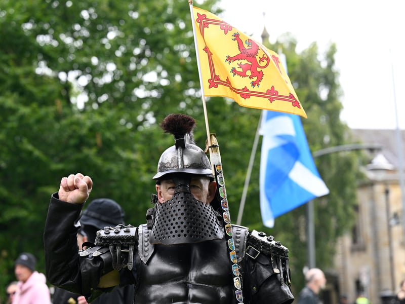 An activist dressed in body armour from the anti-immigration protest, organised by Unite the Clans Scotland, at Glasgow Green. 