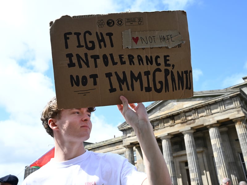 Campaigners from Stand Up To Racism stage a counter-protest to the Unite the Clans Scotland anti-immigration protest, in Glasgow.