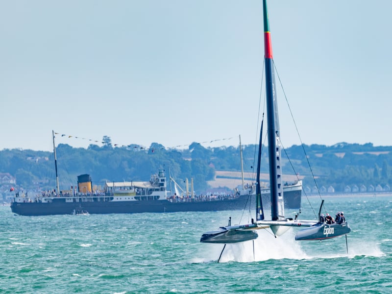 SailGP racing with SS Shieldhall in background.