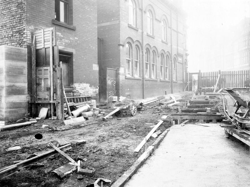 Construction of York Road between North Street and Regent Street, following the line of Hope Street. Road works, with line for transporting goods vehicles. Building on left, Hope Brewery, owned by Leeds and Wakefield Breweries (Melbourne Breweries). Pictured in November 1909.