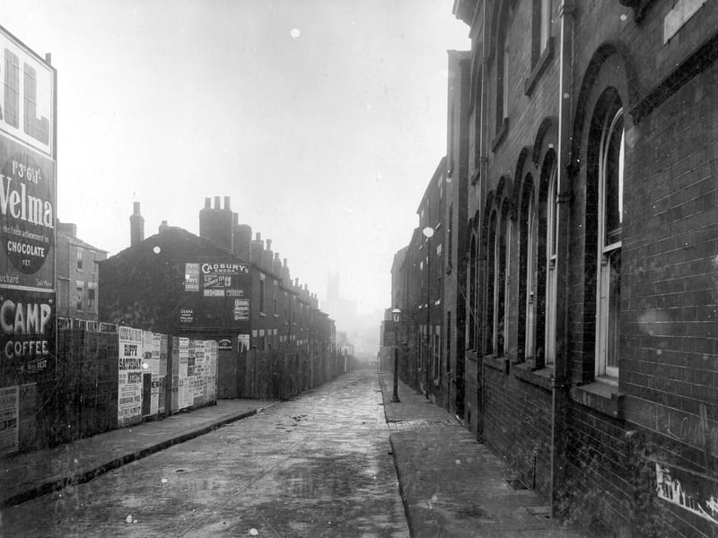 Looking from North Street end to Regent Street, prior to construction of York Road. Street sign on end of wall is for Copenhagen Street, which ran parallel to the left. Pictured in November 1908.