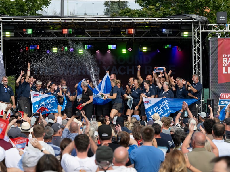 Teams celebrating after the end of the race.