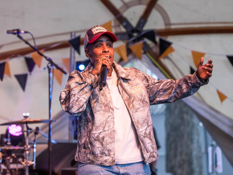 A performer takes to to the stage at Tramlines 2026 at Hillsborough Park. Photo: Errol Edwards