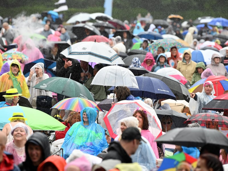 Heavy showers couldn't keep the crowds away.