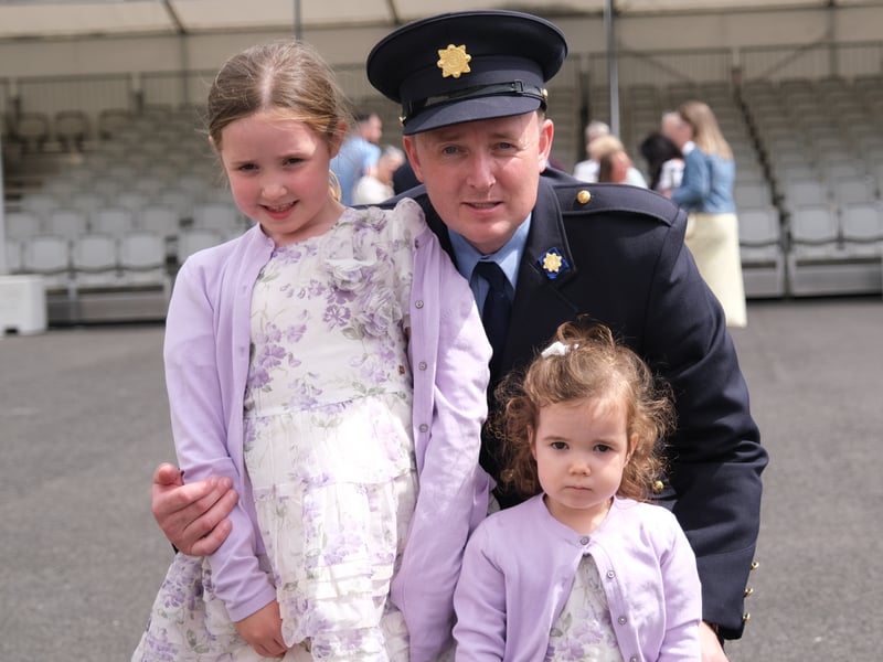 Derek Moroney with his daughters.