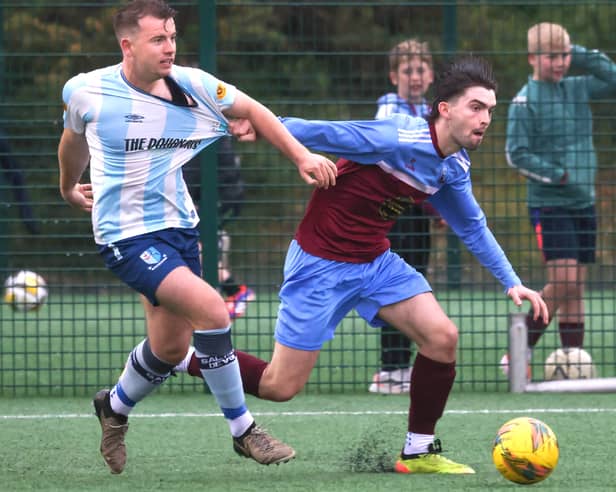 Colin Kelly of Salthill Devon and Ben O'Gorman of Mervue United in action in the 2025 Brod Trill Premier Division final at Drom.