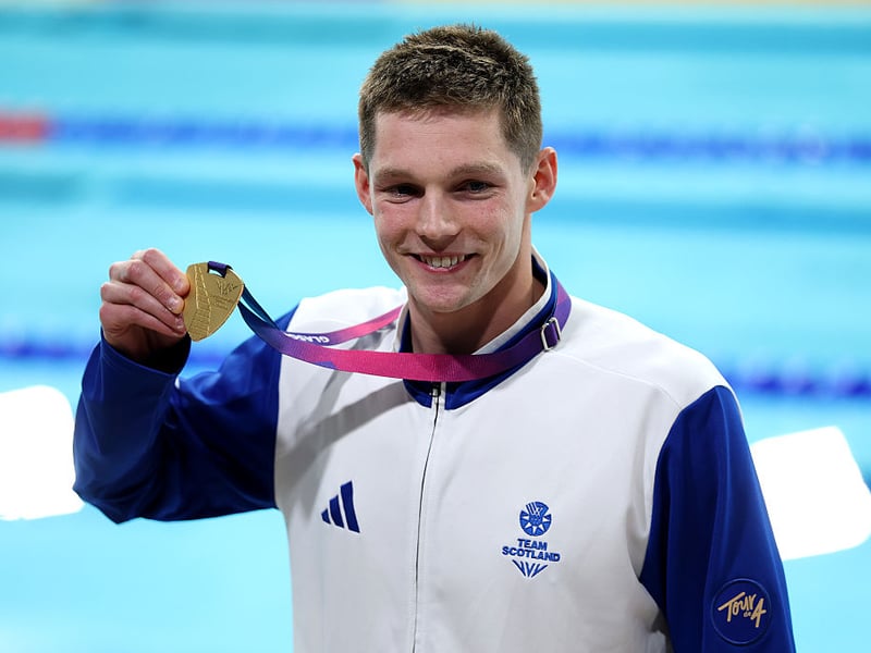 Gold: 200m individual medley swimming