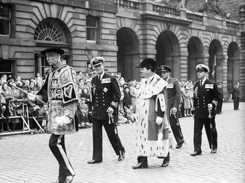Prince Philip, the Duke of Edinburgh, and Lord Provost James Miller lead the procession up the Royal Mile from Edinburgh City Chambers to St Giles to open the 1952 Festival.