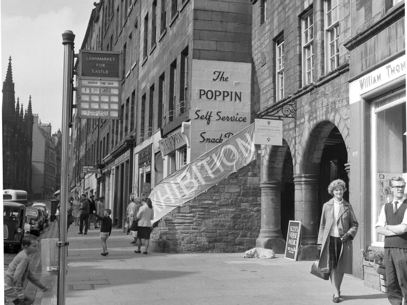 Advertising for the Edinburgh Festival 1966 in the Royal Mile at the Poppin Snack Bar.