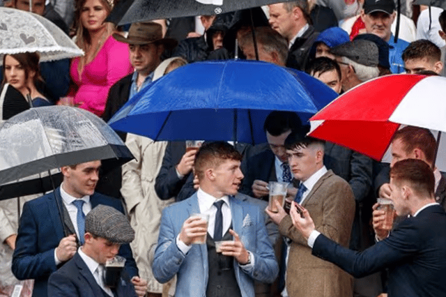 Galway Races punters protected from the rain