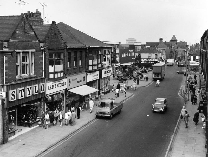 Shops on Carlton Street, Castleford, in July 1971, including Stylo, Army Stores, Ready Foods, Wallace Arnold and Marcer