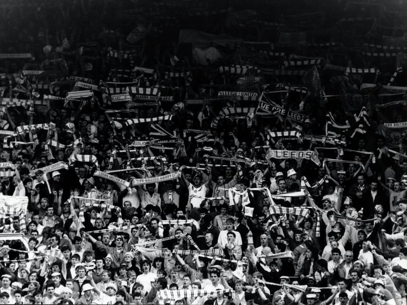 Leeds United fans celebrate after watching the Whites demolish Birmingham City 4-0 at Elland Road in May 1987.