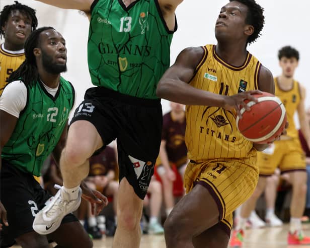 Maree's John Burke (left) and Declan Gbinigie of Titans in action in last season's Men's Division One semi-final in Calasanctius College in Oranmore.