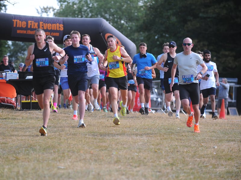 Graham Thomson (left,) who led from start to finish, setting off on the half marathon.