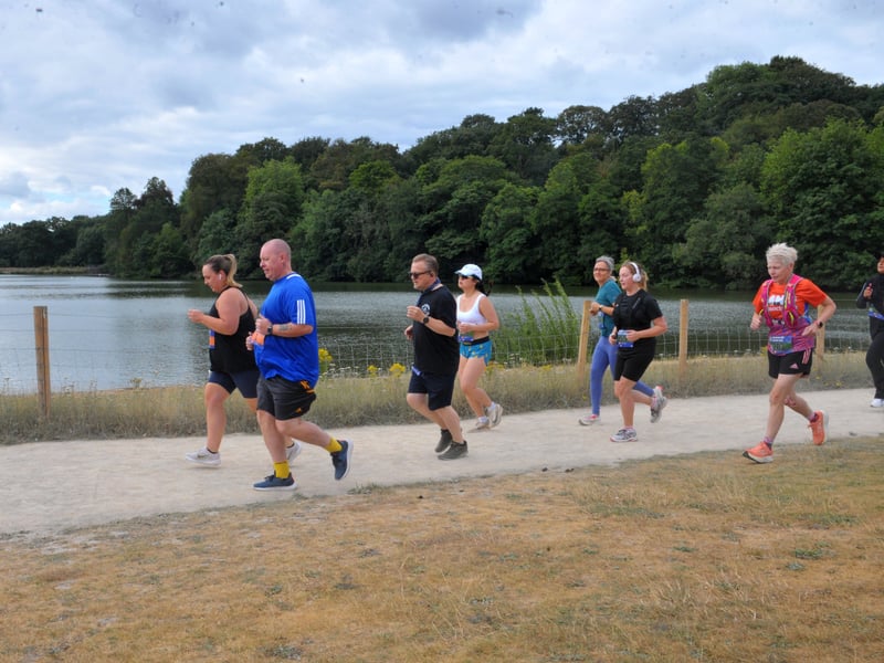 Runners passing Waterloo Lake.