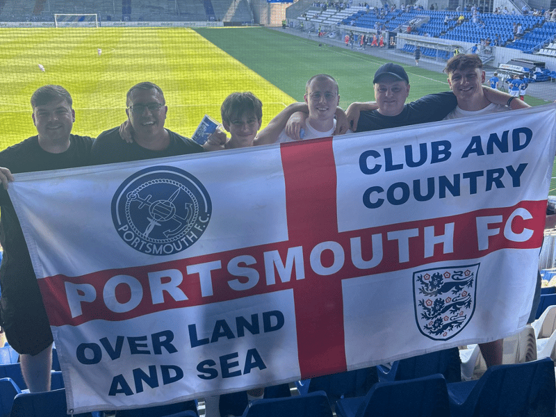 The Pompey flags were on display in the away end.