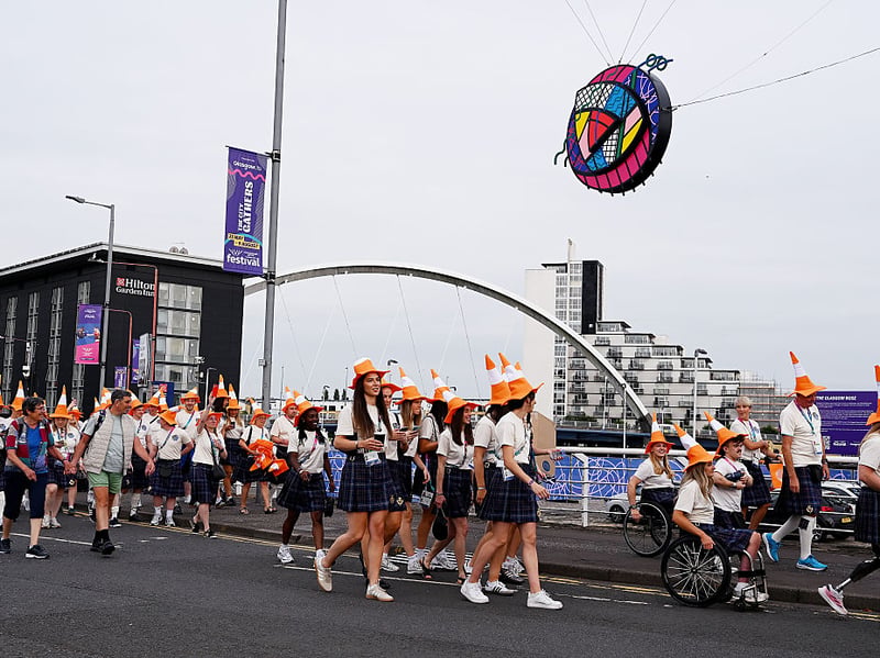 Team Members from Scotland in kilts arrive at The Hydro for The Closing Ceremony.