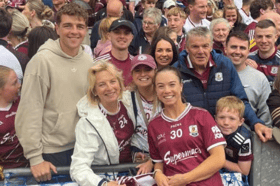 Aoife Ní Cheallaigh with fiancée David Reidy and family at Croke Park.