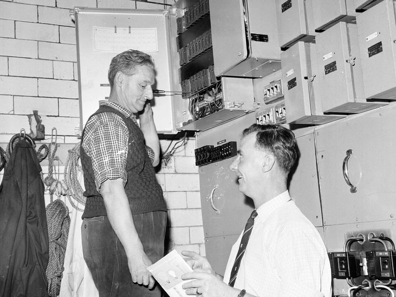 Electricians check over the lighting for the Tattoo in 1961.