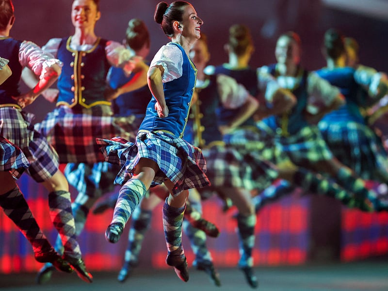 Kilted dancers take to the arena.