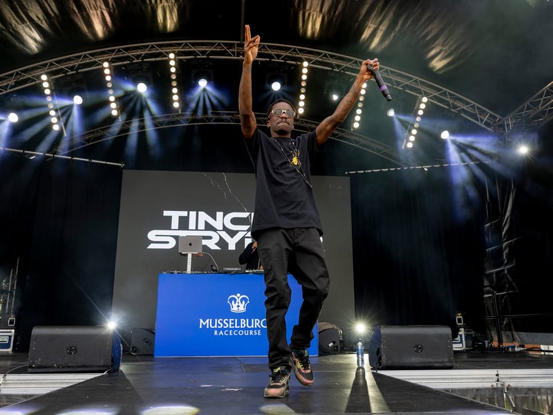 A guest appearance by rapper, singer and songwriter Tinchy Strider at Ladies Day after party