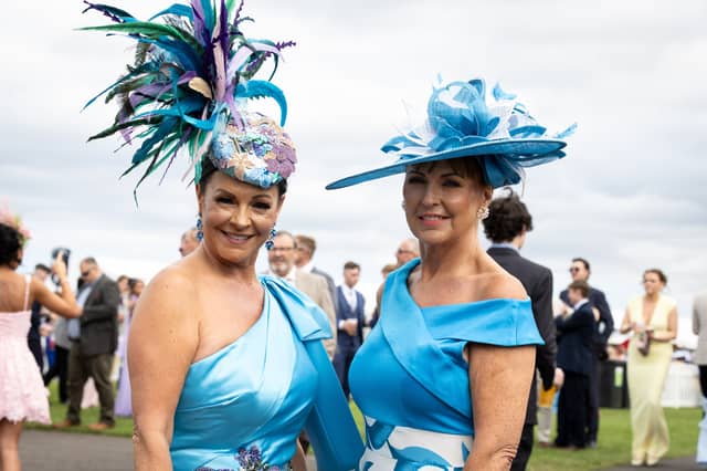 Dianne Kenny and Donna Laws enjoy Ladies Day in matching blue
