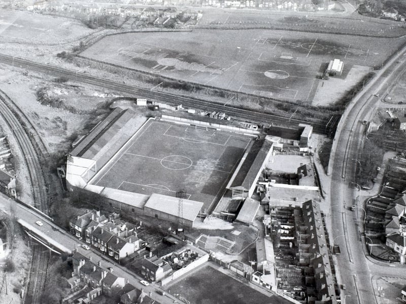 This aerial view offers a fascinating glimpse of Fellows Park, the former home of Walsall Football Club, during its footballing heyday. From above, the stadium and surrounding streets give a very different perspective of the ground that was once so familiar to Saddlers supporters. Do you remember watching Walsall at Fellows Park, or travelling to matches here?