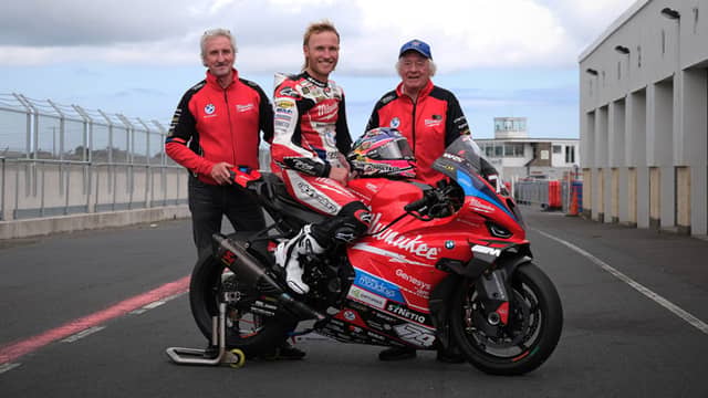 Davey Todd pictured with Philip and Hector Neill.