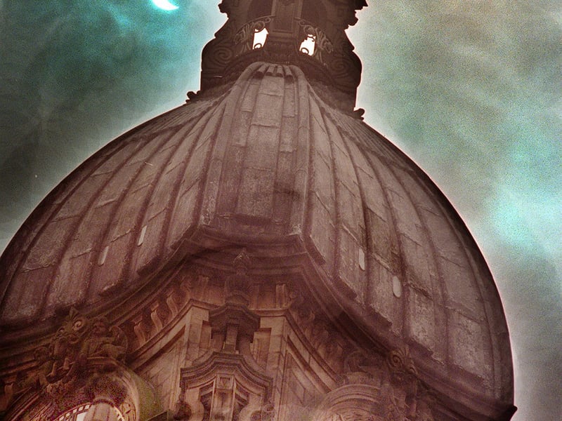 The Victorian architecture of Leeds Town Hall framed against the changing light as the Moon passes across the Sun during the August 11, 1999 solar eclipse.