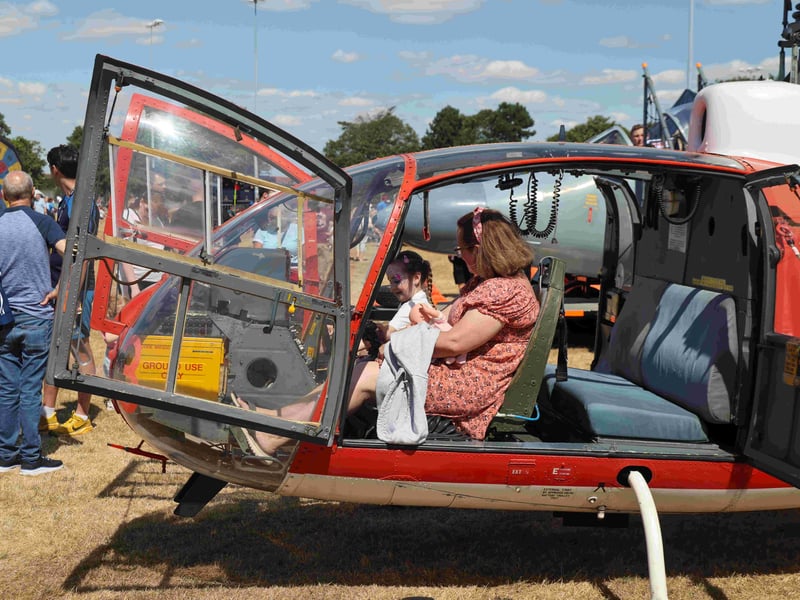 Families enjoy airframe and survival equipment displays at the HMS Sultan Families Day.