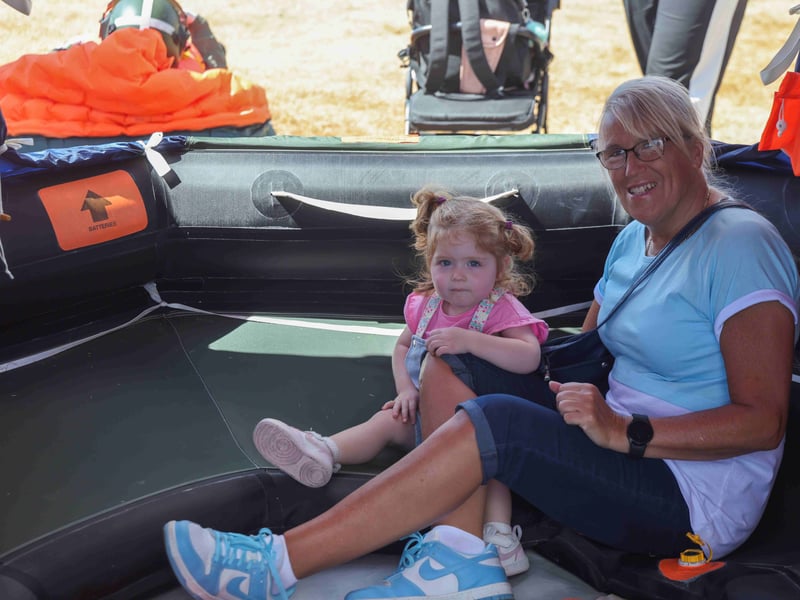 Families enjoy airframe and survival equipment displays at the HMS Sultan Families Day.